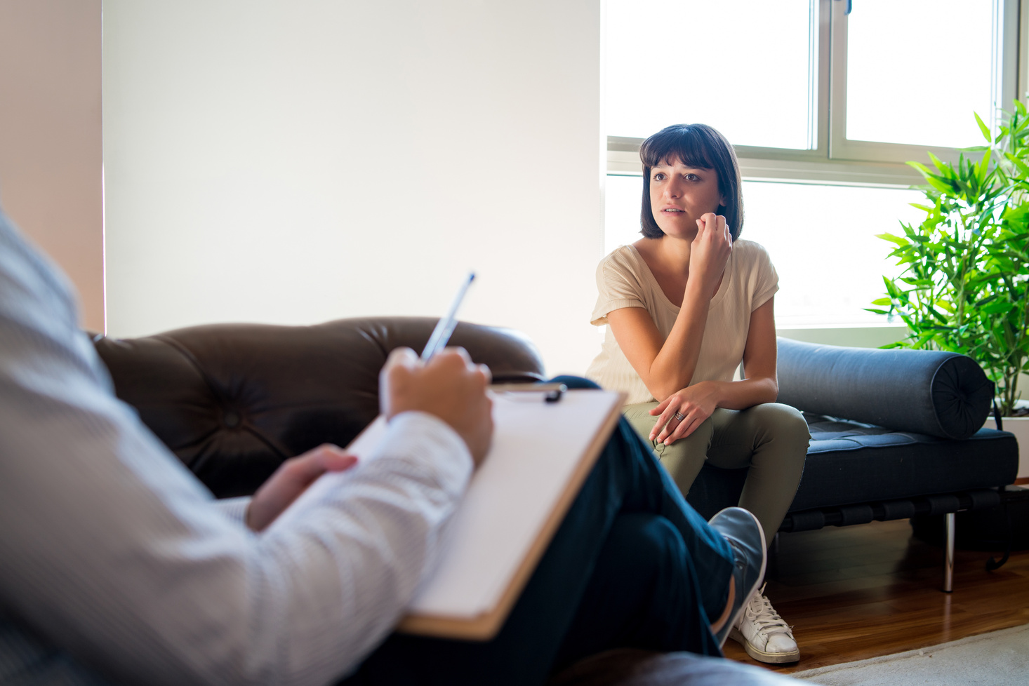 Psychologist Taking Notes during Therapy Session.